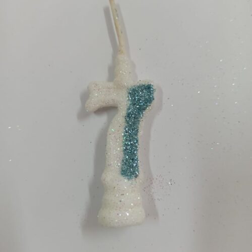 VELA CON BRILLO NUMERO 7 RACING